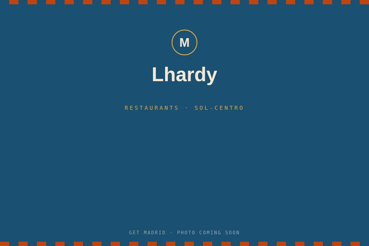 Elegant 19th-century dining room interior at Lhardy restaurant in Madrid
