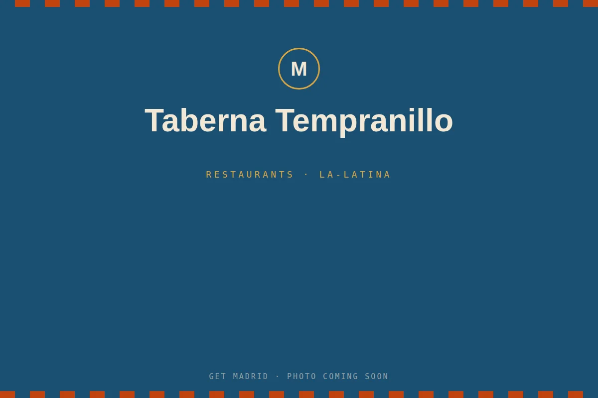 Glasses of Spanish wine and tapas on a table at Taberna Tempranillo in Madrid